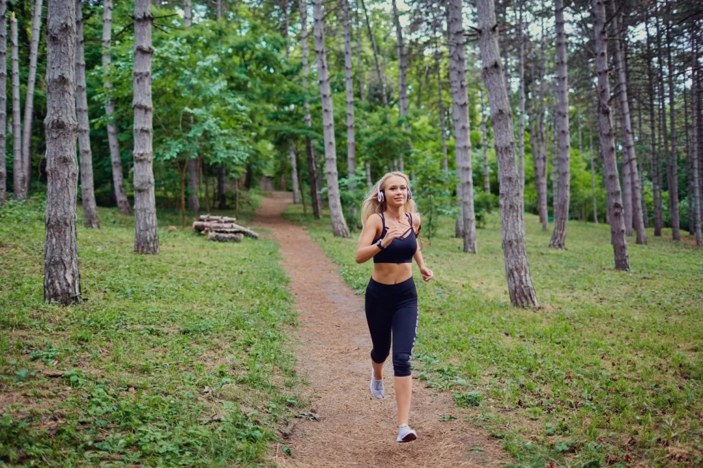 Female going for a run in the forest